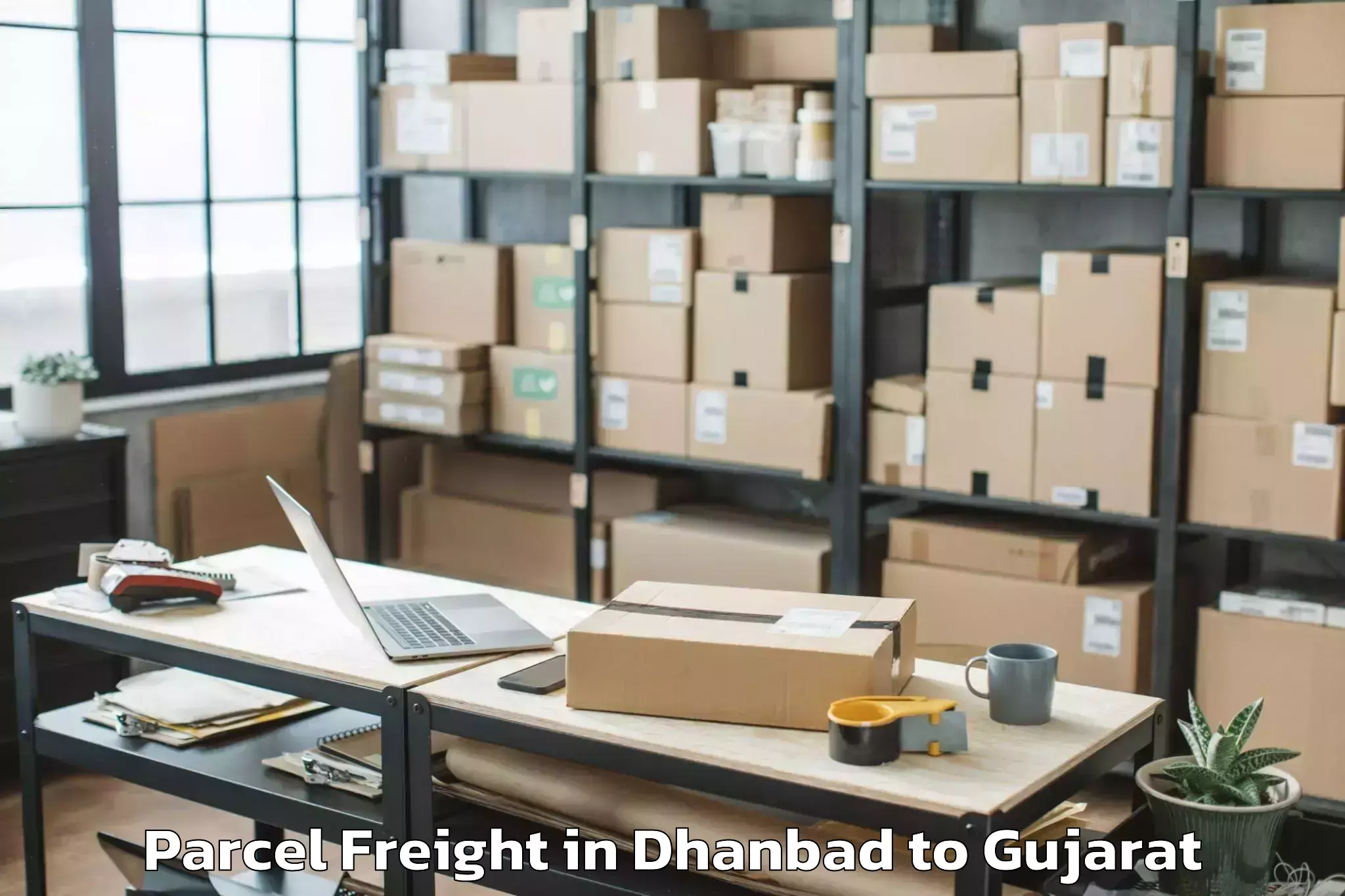 Book Dhanbad to Halol Parcel Freight Online